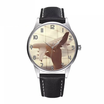 Follow Your Dreams aviation-themed watch with leather strap, polished leather strap.