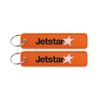 Thumbnail for JetStar (Orange) aviation Remove Before Flight key chain, aviation-tag style webbing.