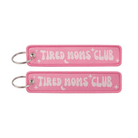 Thumbnail for TIRED MOMS CLUB aviation fashion key chain in polished metal.