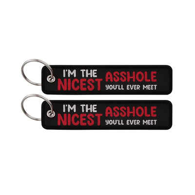I'M THE NICEST ASSHOLE YOU'LL EVER MEET aviation fashion key chain in polished metal.