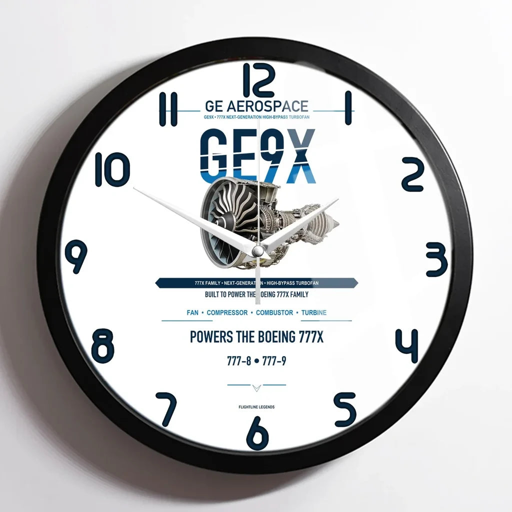 GE9X design on white framed wall clock