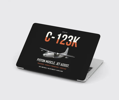 C-123K Provider design on black MacBook case