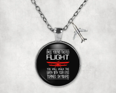 Side view of Once You've Tasted Flight aviation necklace in stainless steel, polished finish.