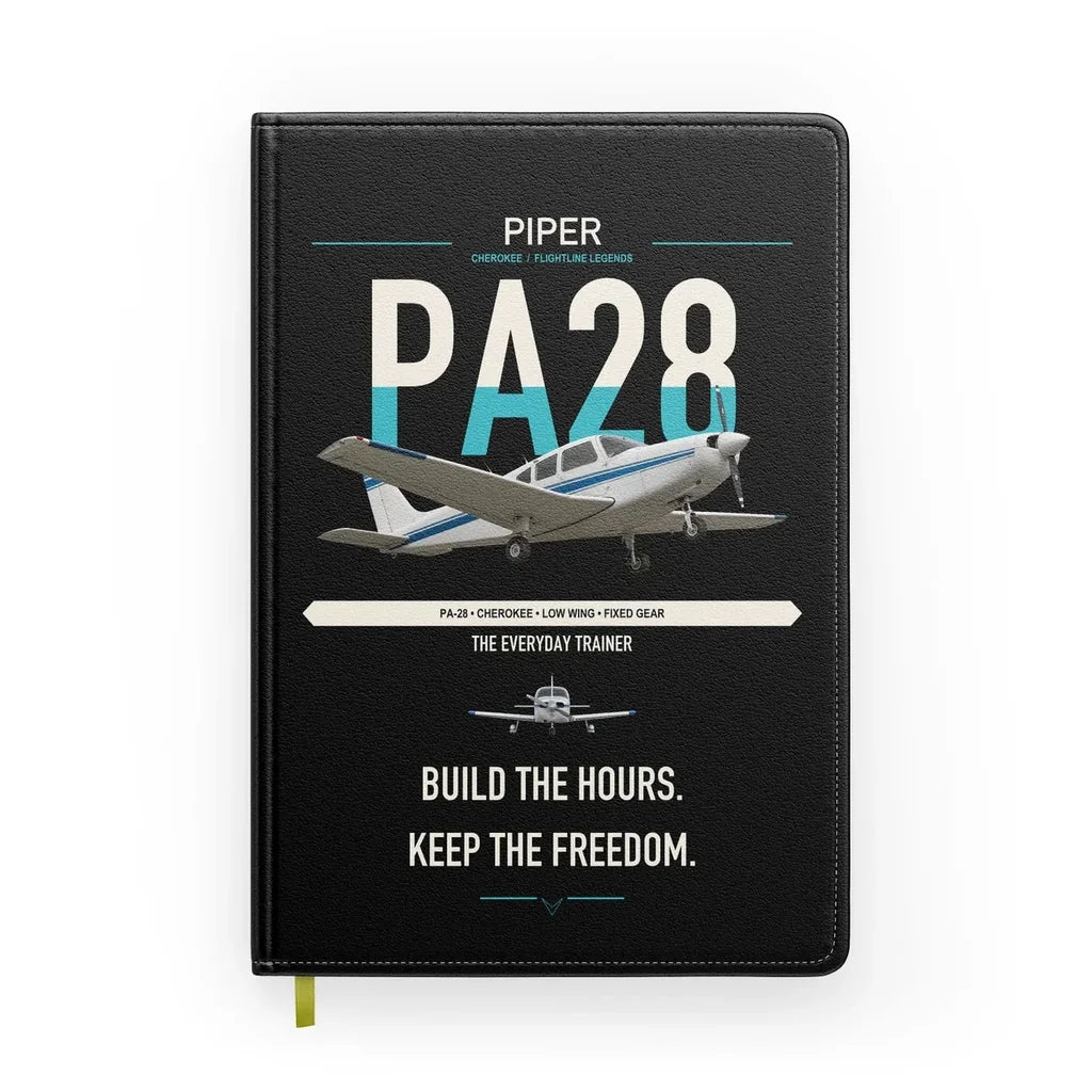 Piper PA-28 Cherokee design on black notebook