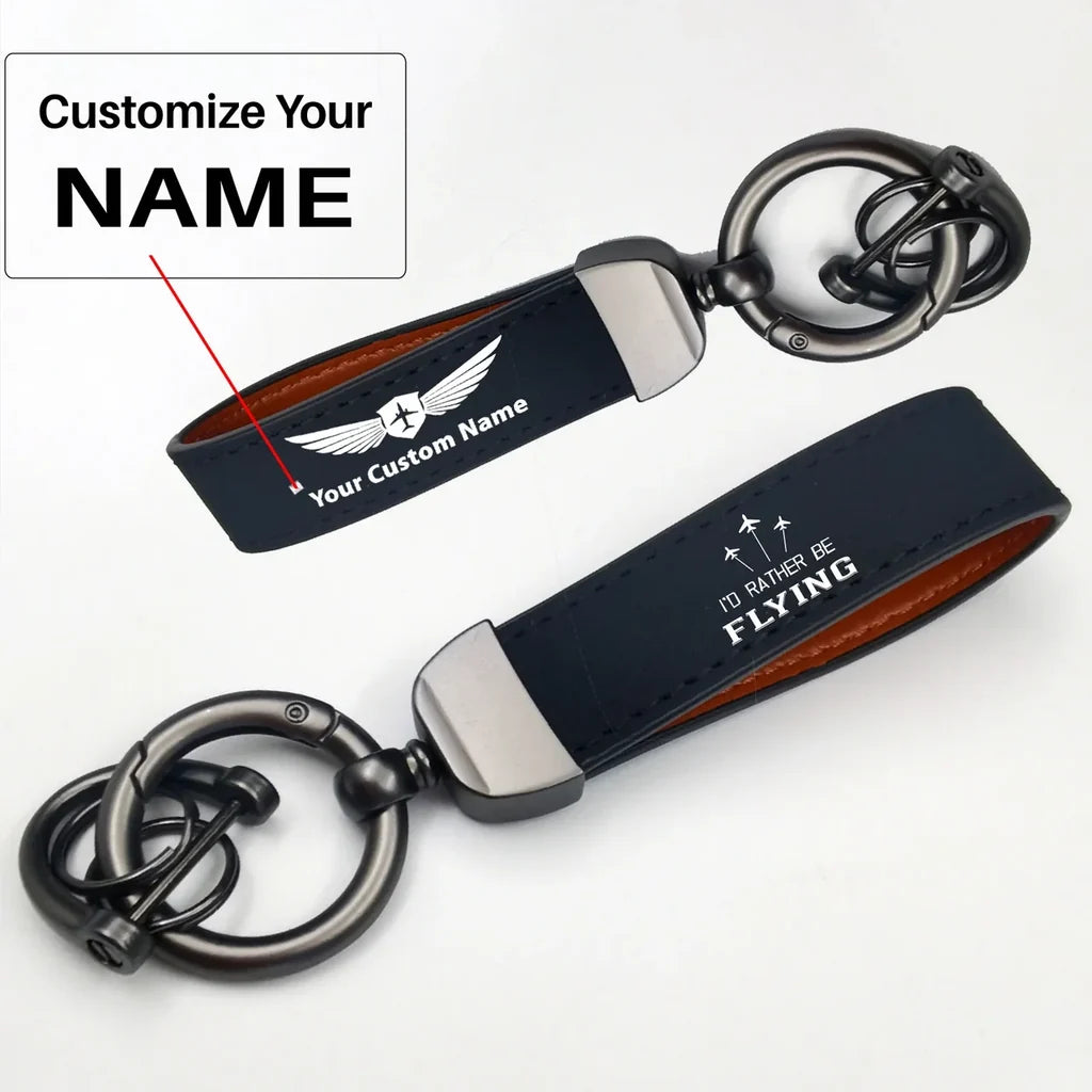 Side view of I'D Rather Be Flying aviation horseshoe-buckle key chain in polished metal alloy, polished finish.