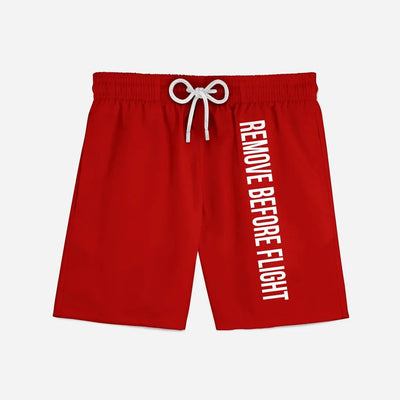 Remove Before Flight 2 (Red) aviation design on quick-dry polyester swim trunks.
