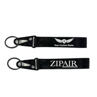 Thumbnail for Zipair aviation hawk-shaped key chain, durable metal alloy.