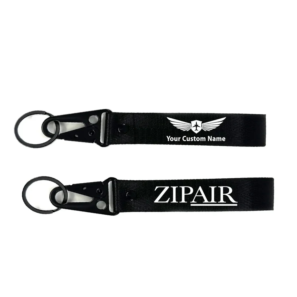 Zipair aviation hawk-shaped key chain, durable metal alloy.