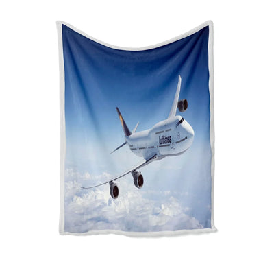Cruising Lufthansa's Boeing 747 Bed Blankets & aviation print on soft fleece blanket.