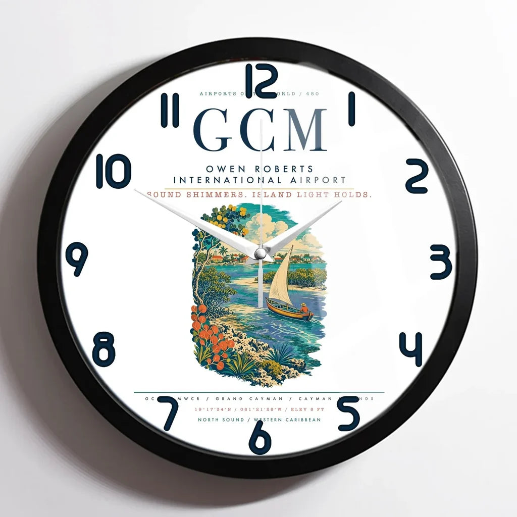 Owen Roberts International Airport (GCM) design on white framed wall clock