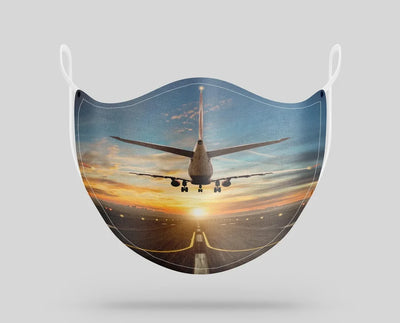 Airplane over Runway Towards the Sunrise aviation face mask in breathable cotton blend.