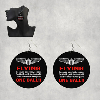 Flying One Ball aviation-themed drop earrings, polished wood with metal hooks.