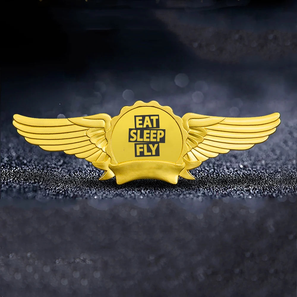 Eat Sleep Fly aviation badge in polished metal.