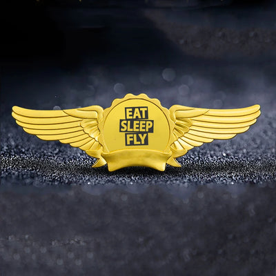 Eat Sleep Fly aviation badge in polished metal.