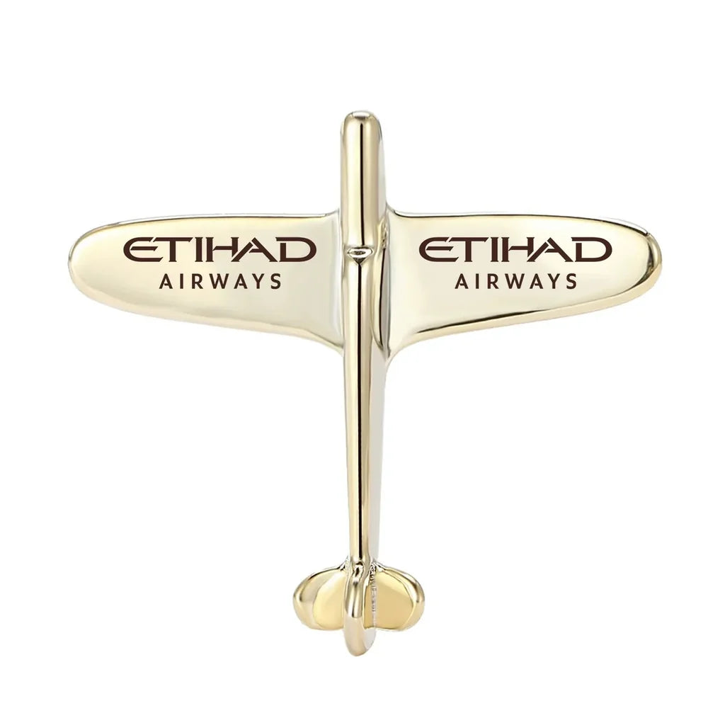 Side view of Etihad Airways Airlines Airplane Shape aviation airplane-shape brooch in polished alloy, polished finish.