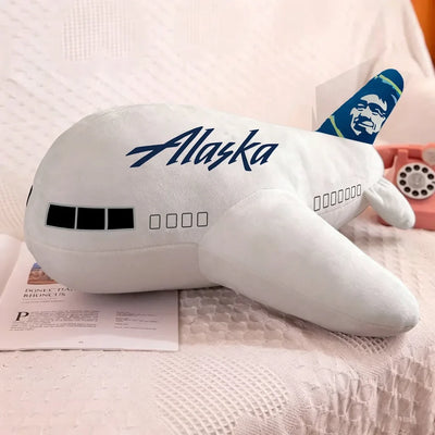 Alaska Airlines aviation design on soft polyester filling airplane-shape decorative pillow.