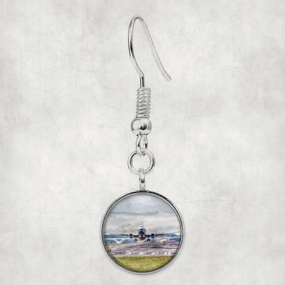 Departing Boeing 737 aviation earrings, hypoallergenic alloy body with engraved detail.