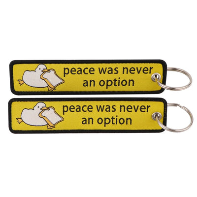 Peace Was Never an Option aviation fashion key chain in polished metal.