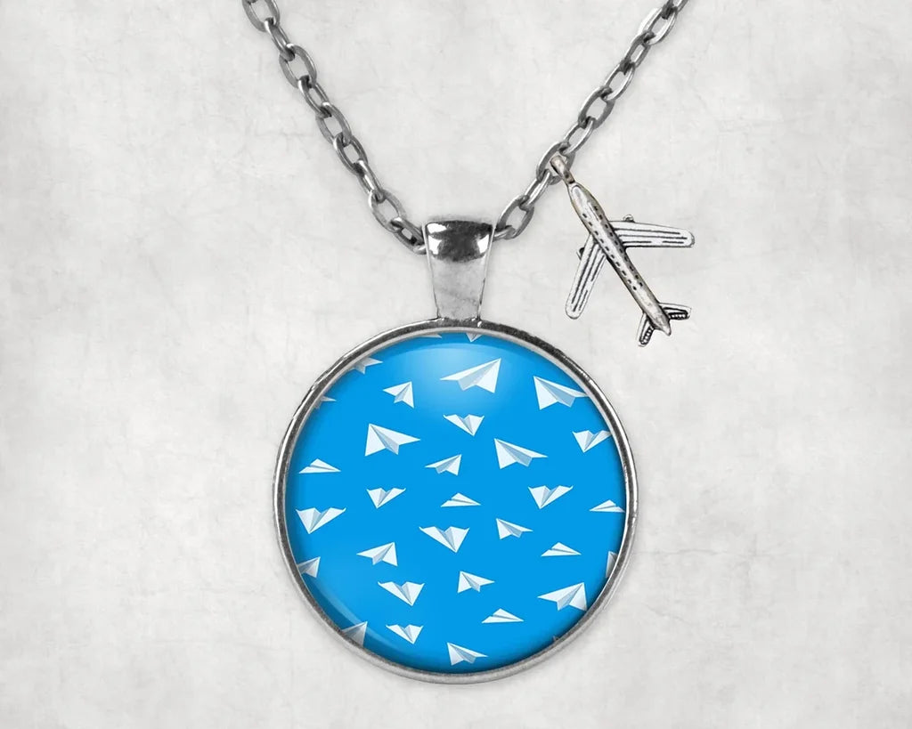 Paper Airplanes aviation necklace, stainless steel body with engraved detail.