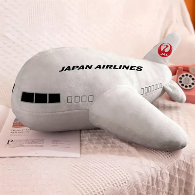 Japan Airlines aviation design on soft polyester filling airplane-shape decorative pillow.