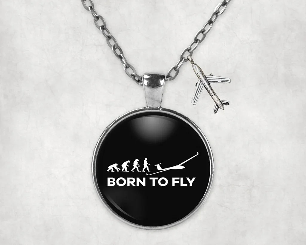 Side view of Born To Fly Glider aviation necklace in stainless steel, polished finish.