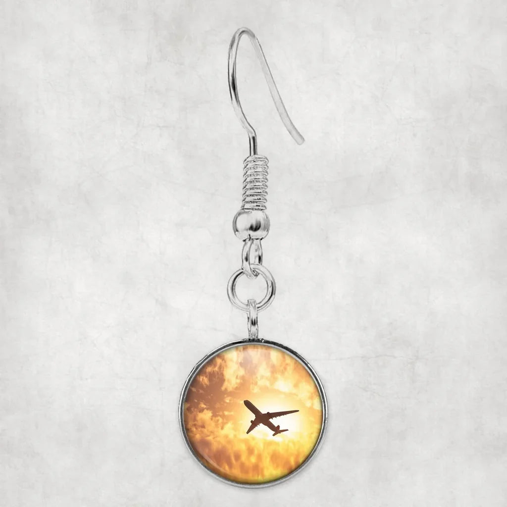 Side view of Plane Passing By aviation earrings in hypoallergenic alloy, polished finish.