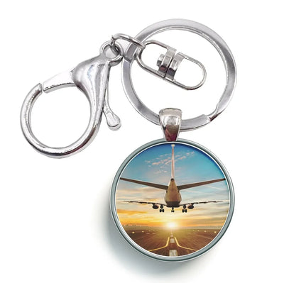 Airplane over Runway Towards the Sunrise aviation circle key chain, stainless-steel disc.