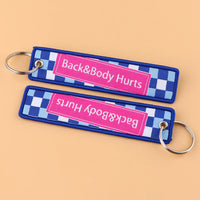Thumbnail for Back&Body Hurts aviation fashion key chain in polished metal.