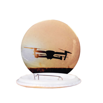 Amazing Drone in Sunset aviation design pin in polished enamel.