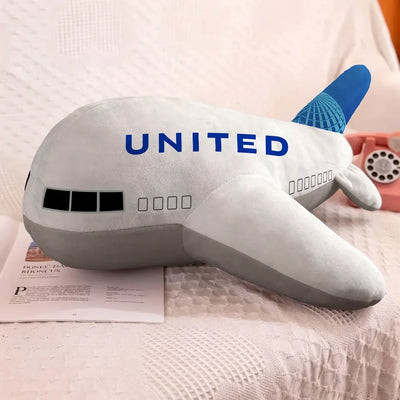 United Airlines aviation design on soft polyester filling airplane-shape decorative pillow.