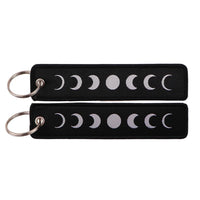 Thumbnail for Moon Phase Flow aviation fashion key chain in polished metal.