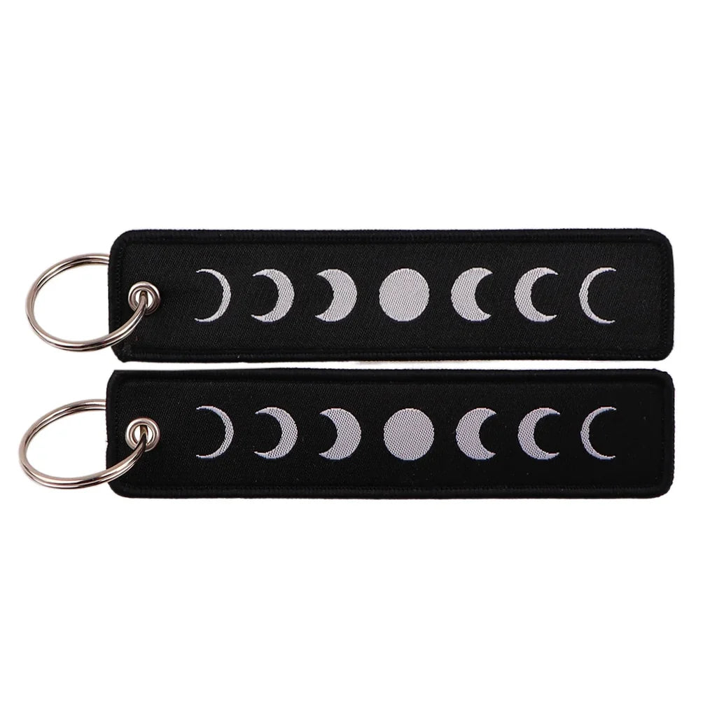 Moon Phase Flow aviation fashion key chain in polished metal.
