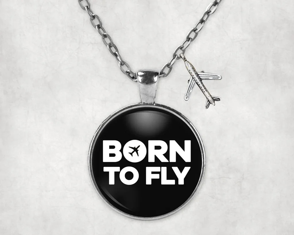 Side view of Born To Fly aviation necklace in stainless steel, polished finish.