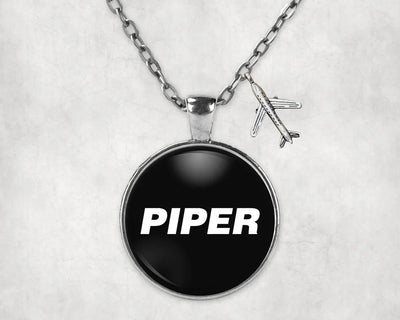 Side view of Piper & Text aviation necklace in stainless steel, polished finish.