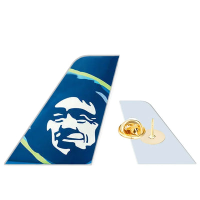Alaska Airlines aviation design tail-shape badge pin in polished alloy.