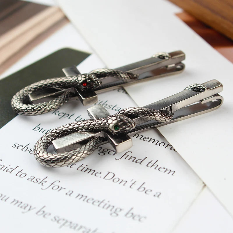 Side view of Copper Serpentine Cross Shaped aviation tie clip in stainless steel, polished finish.
