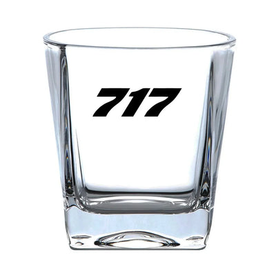 Boeing 717 Flat Text aviation design on whiskey glass, crystal-clear premium glassware.