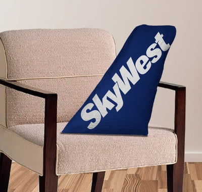 Skywest Airlines aviation design on soft polyester filling aircraft tail pillow.