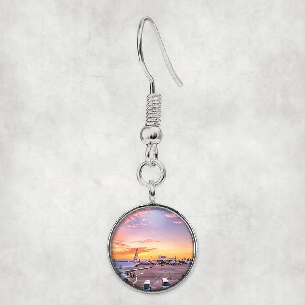 Side view of Airport Photo During Sunset aviation earrings in hypoallergenic alloy, polished finish.