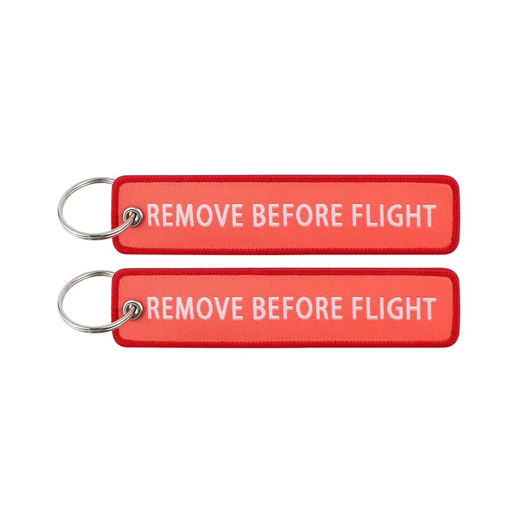 Remove Before Flight aviation Remove Before Flight key chain, aviation-tag style webbing.