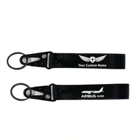 Thumbnail for The Airbus A220 aviation hawk-shaped key chain, durable metal alloy.