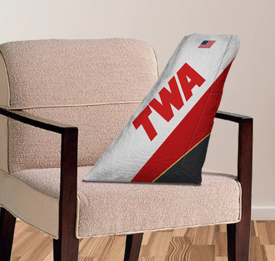 Trans World Airlines (TWA) aviation design on soft polyester filling aircraft tail pillow.