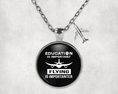 Side view of Flying is Importanter aviation necklace in stainless steel, polished finish.
