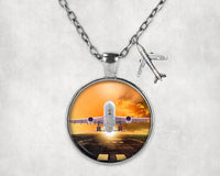 Thumbnail for Amazing Departing Aircraft Sunset & Clouds Behind aviation-themed necklace, polished stainless steel.