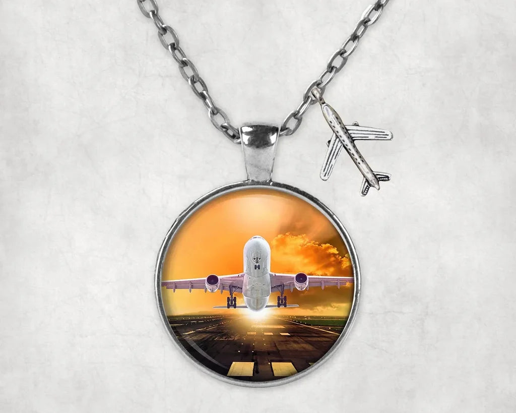 Amazing Departing Aircraft Sunset & Clouds Behind aviation-themed necklace, polished stainless steel.