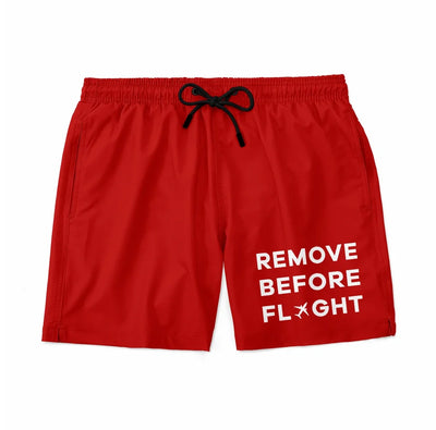 Remove Before Flight aviation design on quick-dry polyester swim trunks.