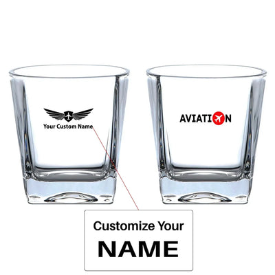 Aviation design on whiskey glass, crystal-clear premium glassware.