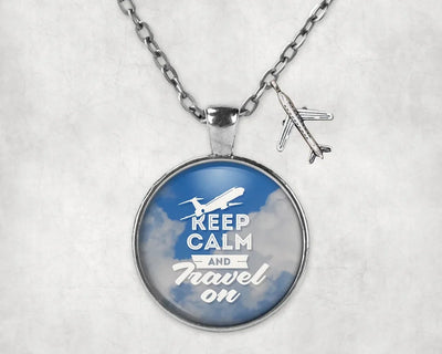 Side view of Keep Calm and Travel On aviation necklace in stainless steel, polished finish.