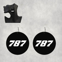 Thumbnail for Side view of Boeing 787 Flat Text aviation drop earrings in wood with metal hooks, polished finish.