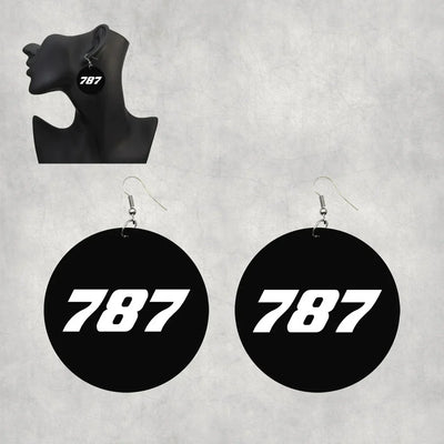 Side view of Boeing 787 Flat Text aviation drop earrings in wood with metal hooks, polished finish.
